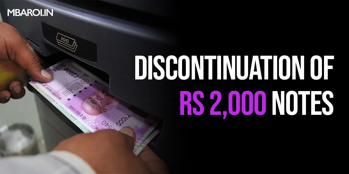Person depositing discontinued ₹2000 currency notes from an ATM